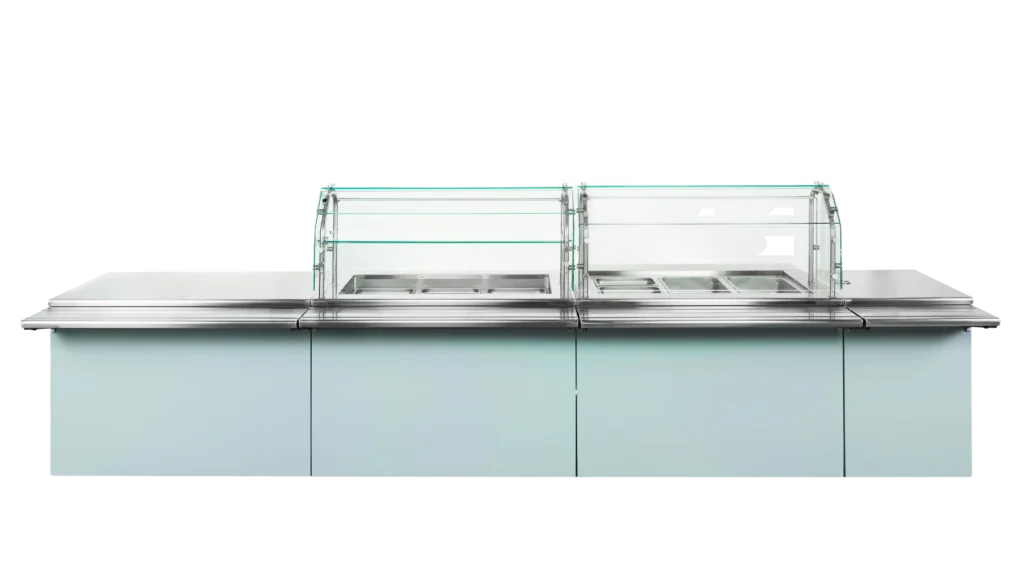 INFINITI FIT modular serving line with glass food guards and stainless steel countertop.