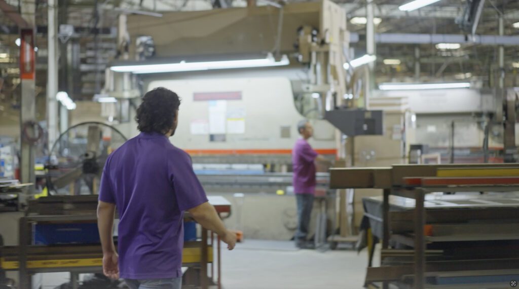 Foodservice equipment manufacturing team on production floor