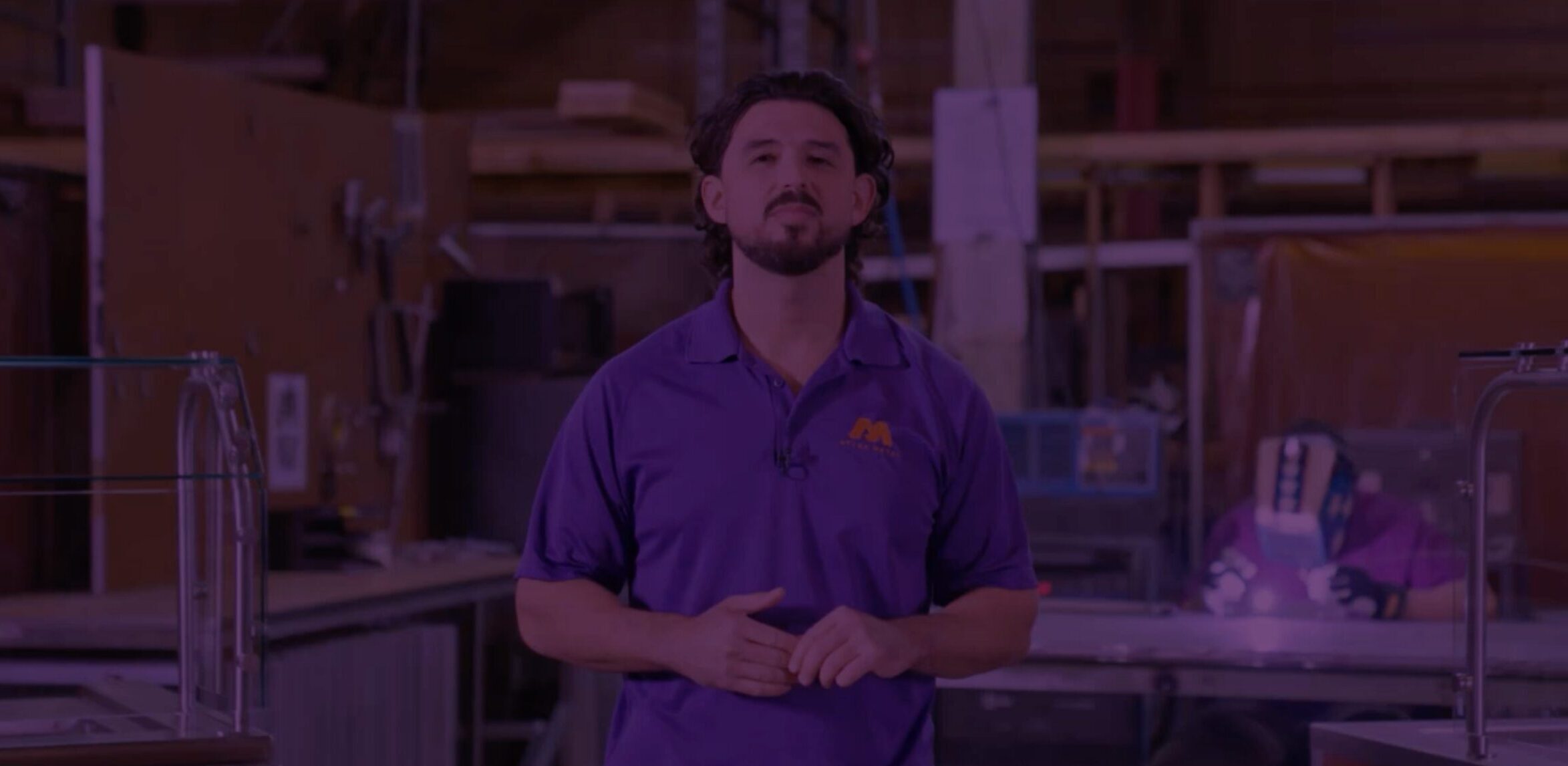 Video thumbnail of Dominick Mongiove Jr., VP of Operations at Atlas Metal, presenting modular serving lines in the manufacturing facility