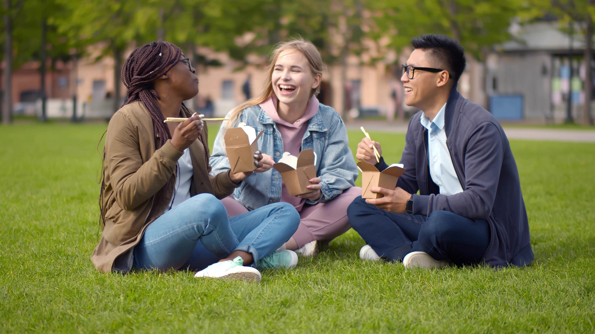 College students eating together on campus