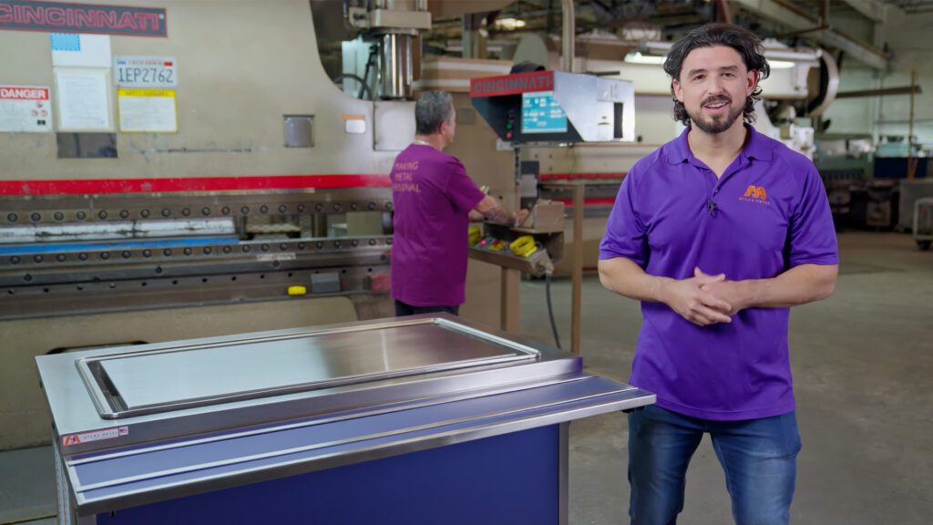 Video thumbnail of Dominick Mongiove Jr., VP of Operations at Atlas Metal, presenting a serving line in the manufacturing facility