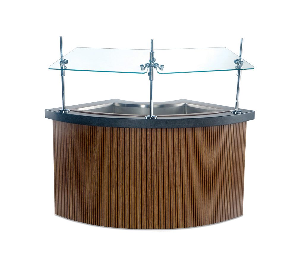 Curved serving line with wood-look front panel, stainless steel wells and glass food guards.